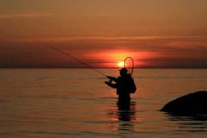 fly fishing shore at sunset